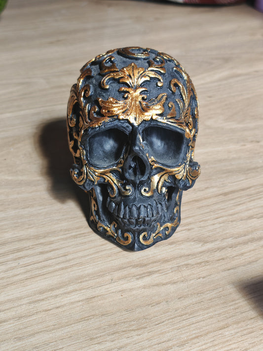 Black/gold skull